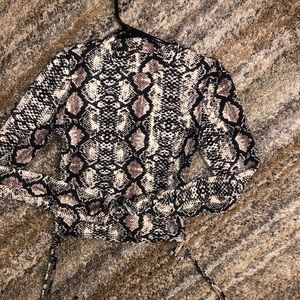 Snake print turtleneck top